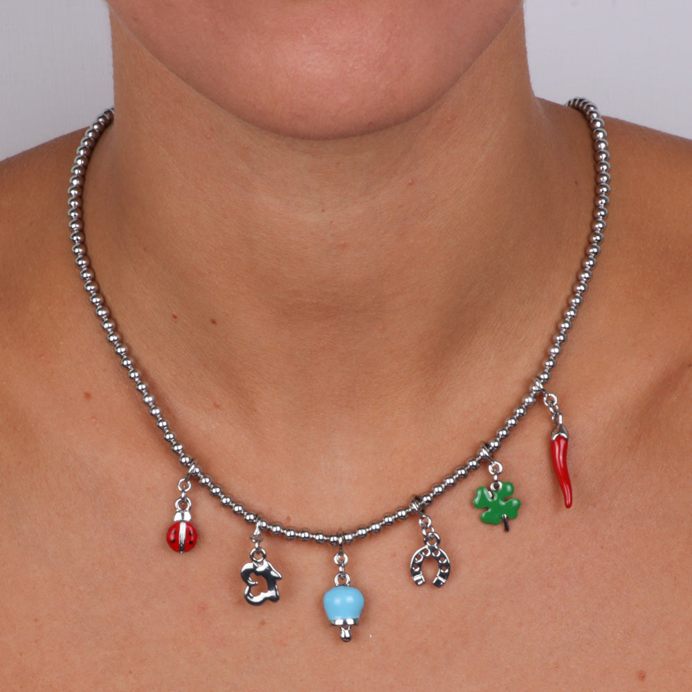 Metal necklace with Neapolitan horn -shaped pendants, four -leaf clover, ladybug, horseshoe, Capri bell, embellished with colored glazes