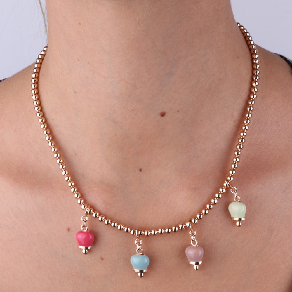 Metal necklace with four bells: blue, pink, green and fuchsia and white crystals