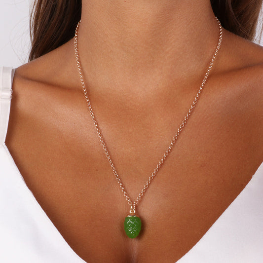 Metal necklace with green charming pine -shaped pendant