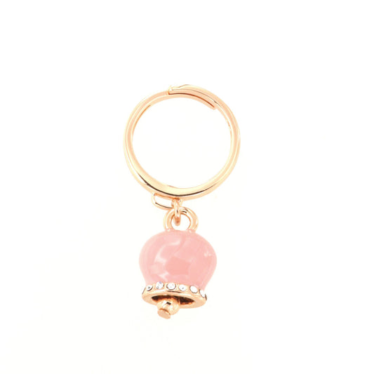 Metal ring with charming bell, embellished with pink enamel and crystals
