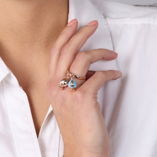 Metal ring with Apulian pumo -shaped pendants, embellished with colored glazes