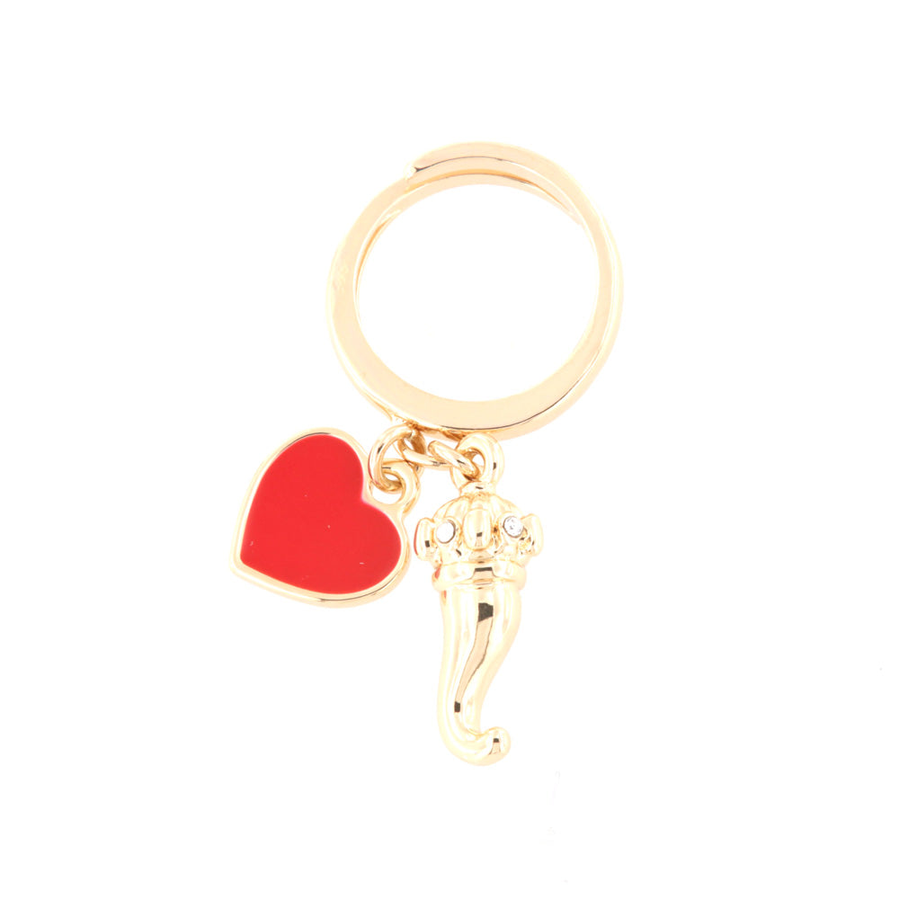 Metal ring with charming hole shapes and red enamel heart
