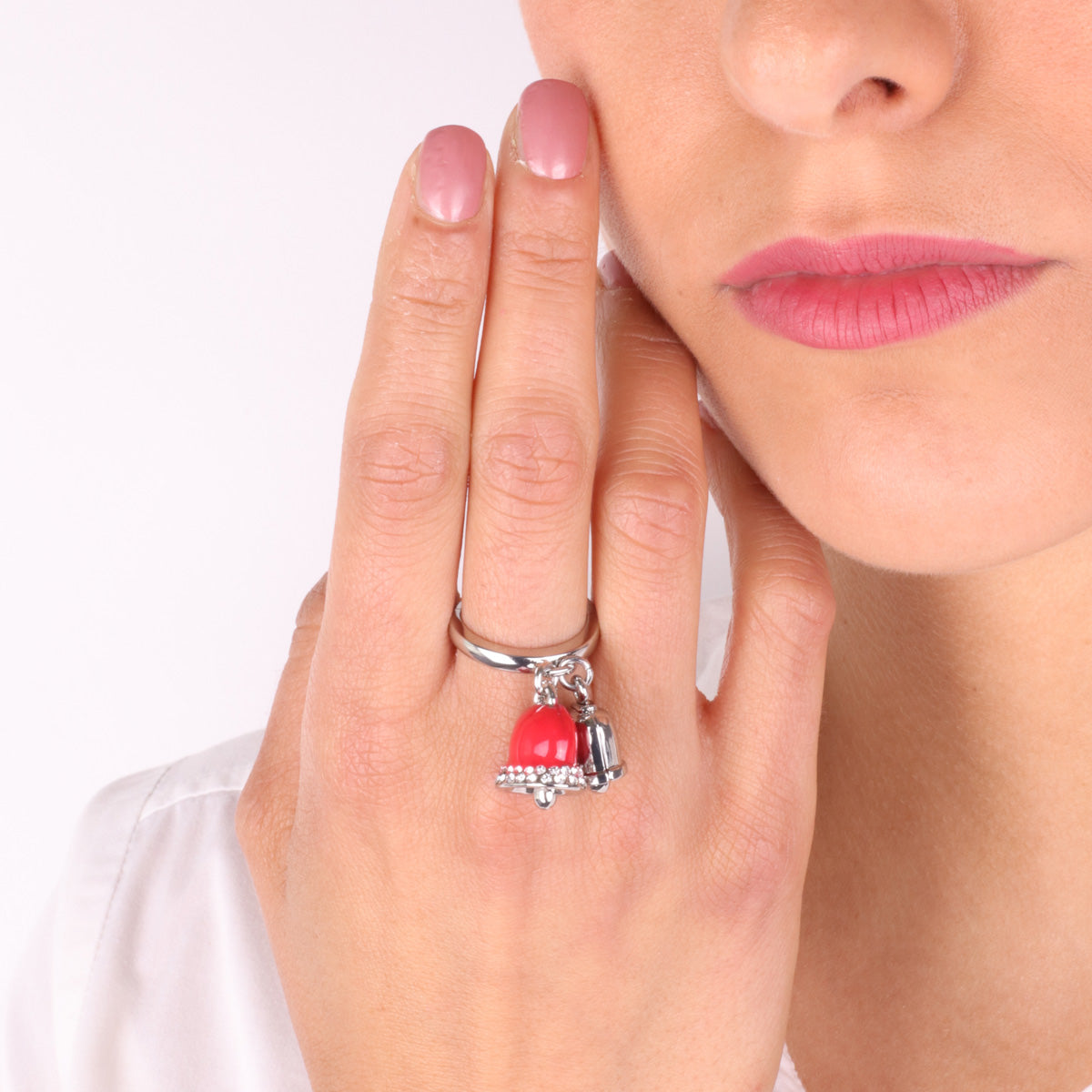 Metal ring with lucky bells with red glazing and white crystals