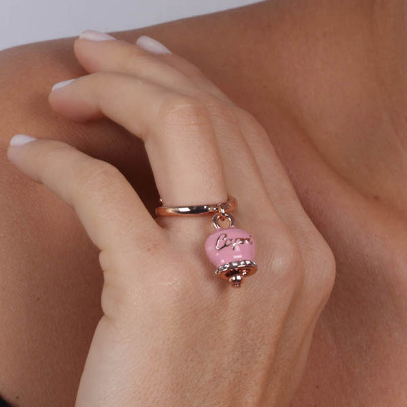 Metal ring with a bouncing bille pendant embellished with pink enamel and crystals