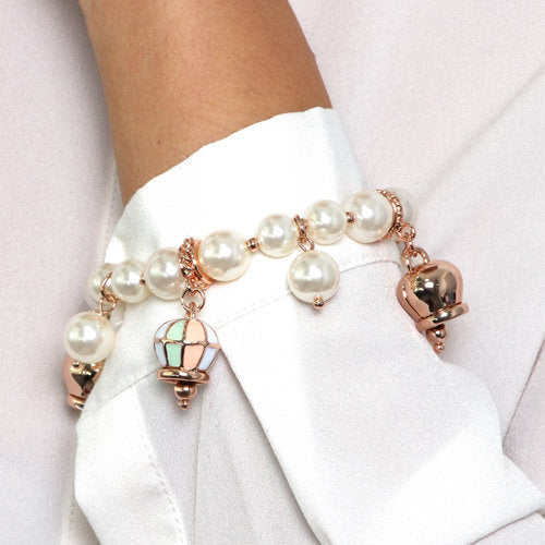 Metal bracelet with pearls and colored bells