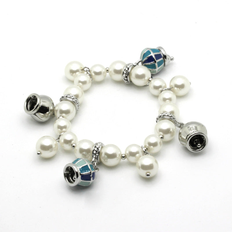 Metal bracelet with pearls and blue bells
