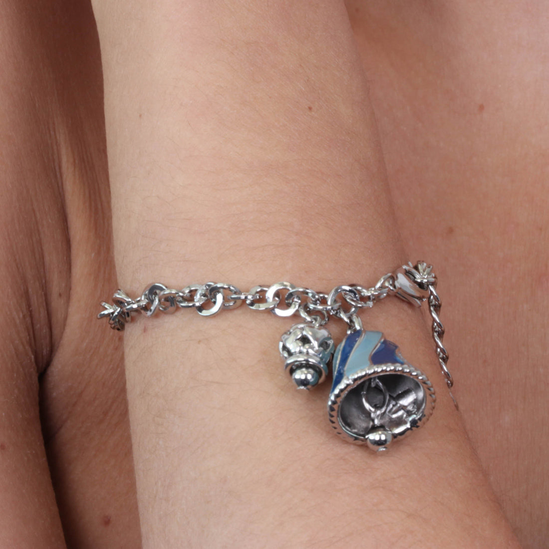 Metal bracelet with blue and blue bell and small bell with hearts