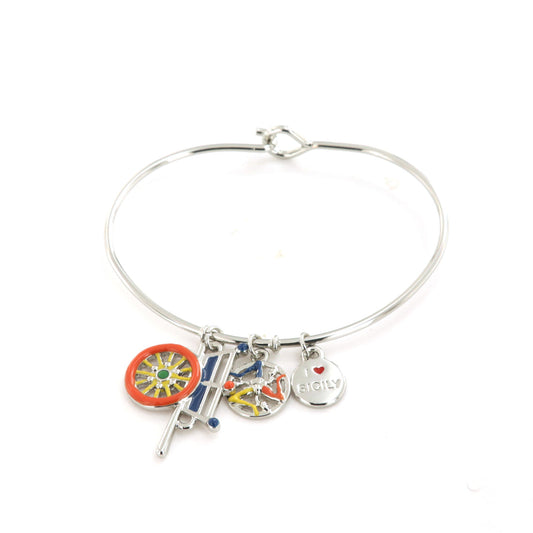 Rigid metal bracelet, with a Sicilian cart and pendent Trinacria, embellished with colored glazes