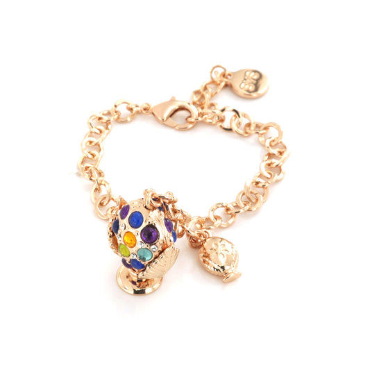 Metal bracelet with pending Apulian pumo, embellished with multicolored stones and lateral pumo pumo