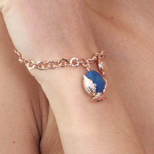 Metal bracelet with pendant Apulian pumo, embellished with blue nail polish and lateral pumo pumo
