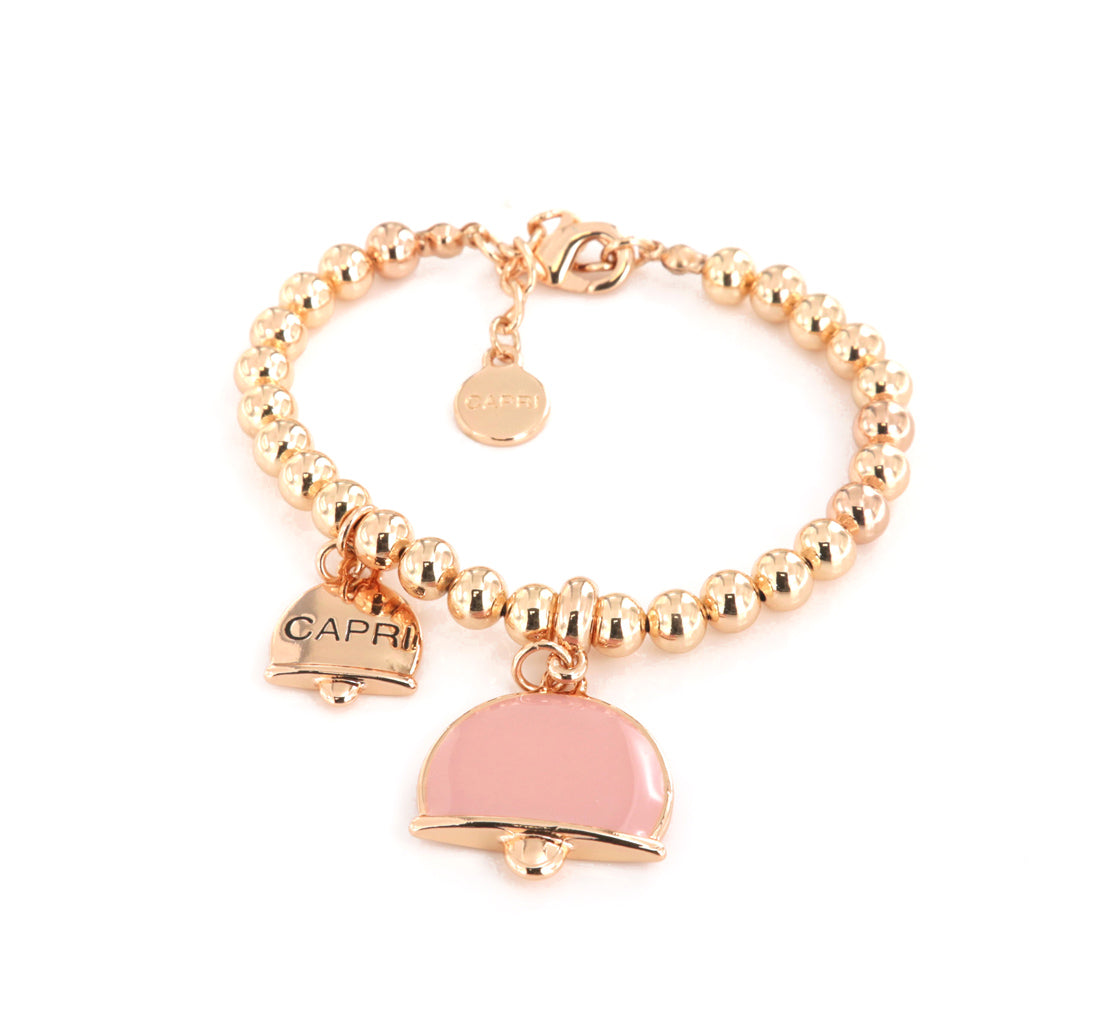 Metal bracelet spheres shirt, with dual crushed bell charm, embellished with pink enamel