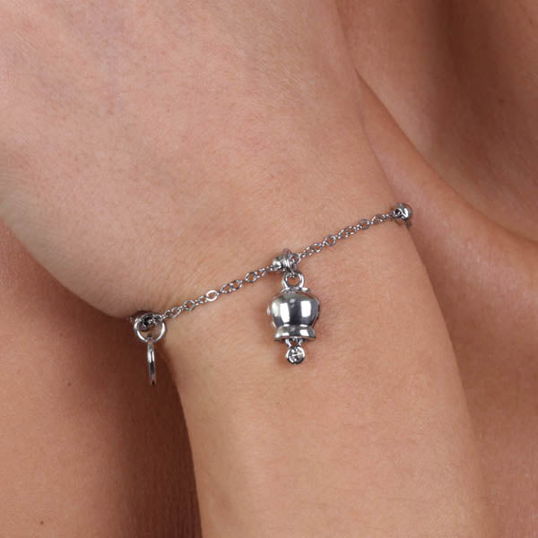 Metal bracelet with pendant charcofish bell, embellished with light point