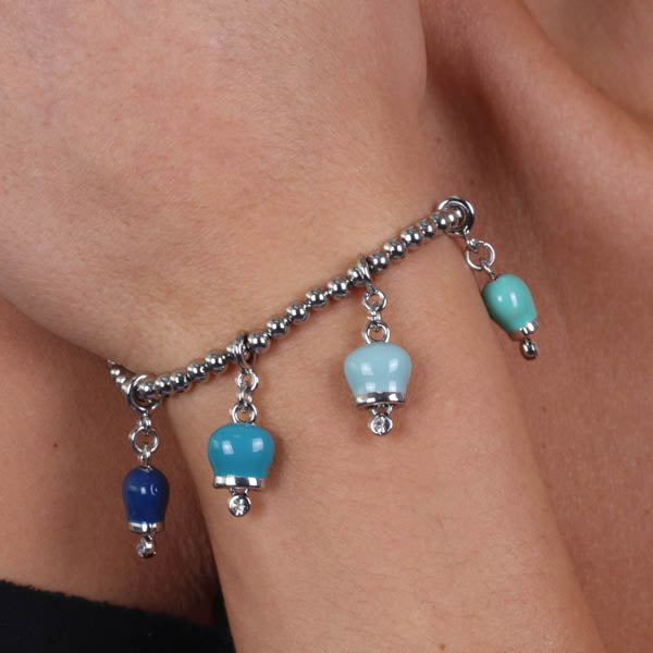 Metal bracelet with four bells in the gradations of blue