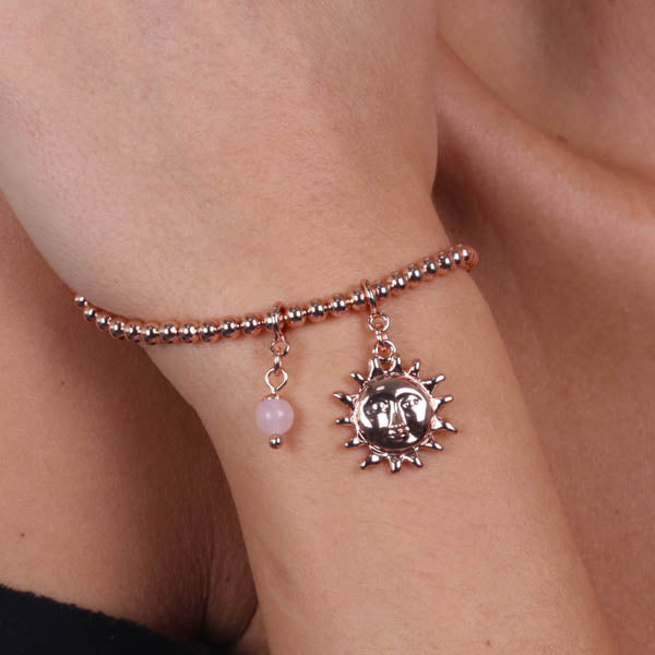 Metal bracelet spheres, with sun and pink bead, pendants