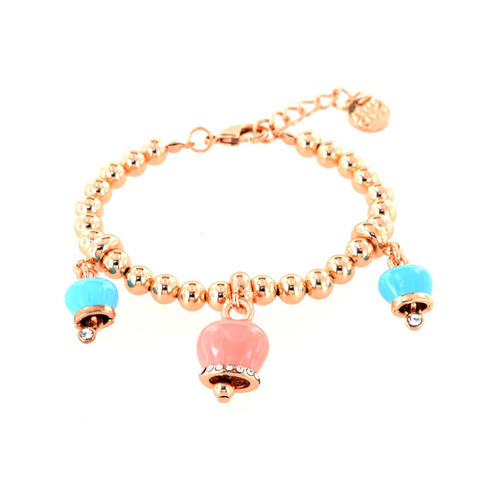 Metal bracelet with pink bell and turquoise with crystals