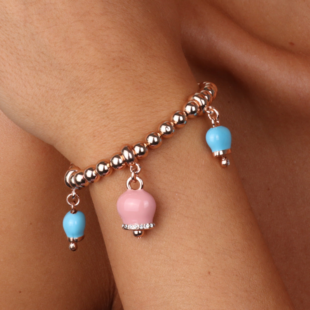 Metal bracelet with pink bell and turquoise with crystals