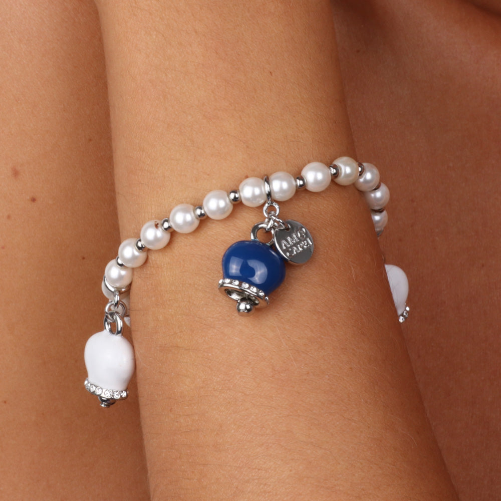 Elastic metal bracelet with pearls, charming bell pendants embellished with white, blue and crystals enamels