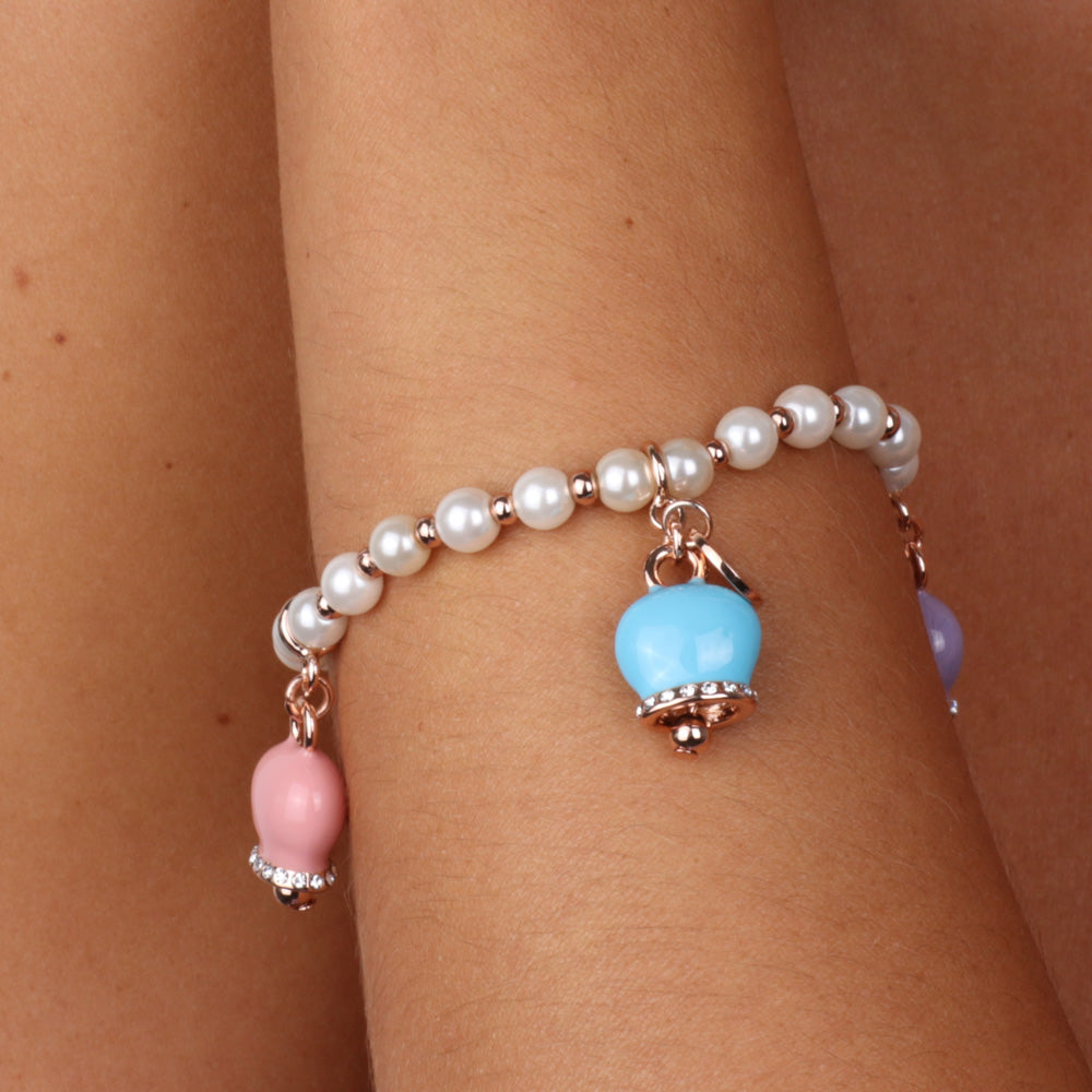Elastic metal bracelet with pearls, charming bell pendants embellished with multicolored glazes and crystals