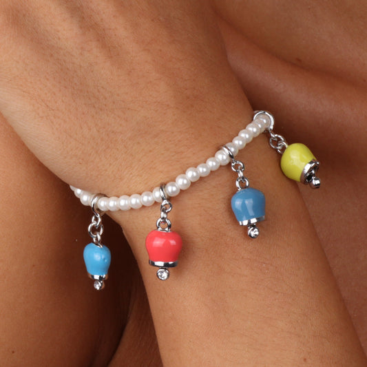 Metal bracelet shirt of beaded, with charms bells embellished with multicolored nail polishes and white crystals