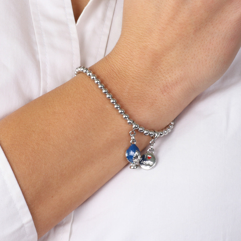 Metal bracelet with Apulian pumo pendant embellished with blue enamel