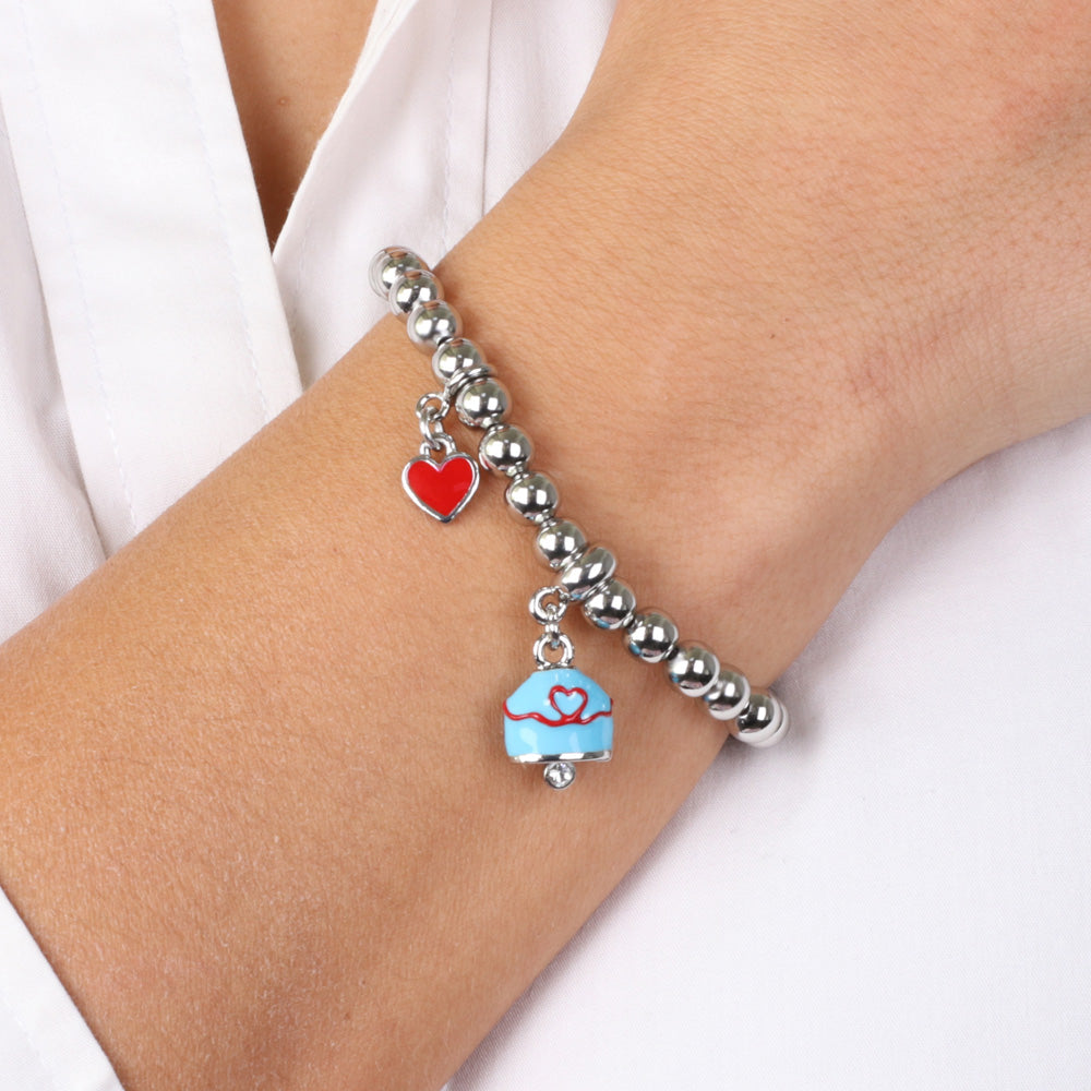 Metal bracelet with turquoise bell and red thread with heart