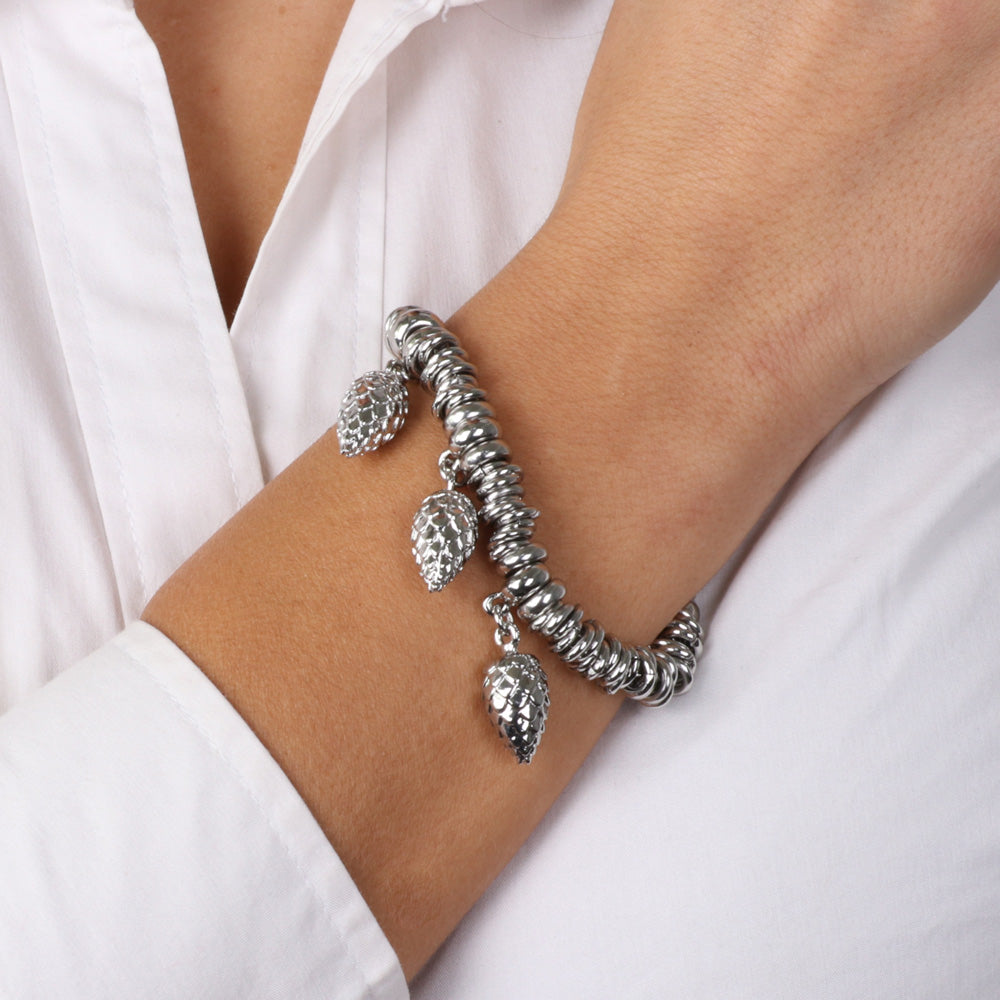 Ring metal bracelet, with trio of pendant pine cones