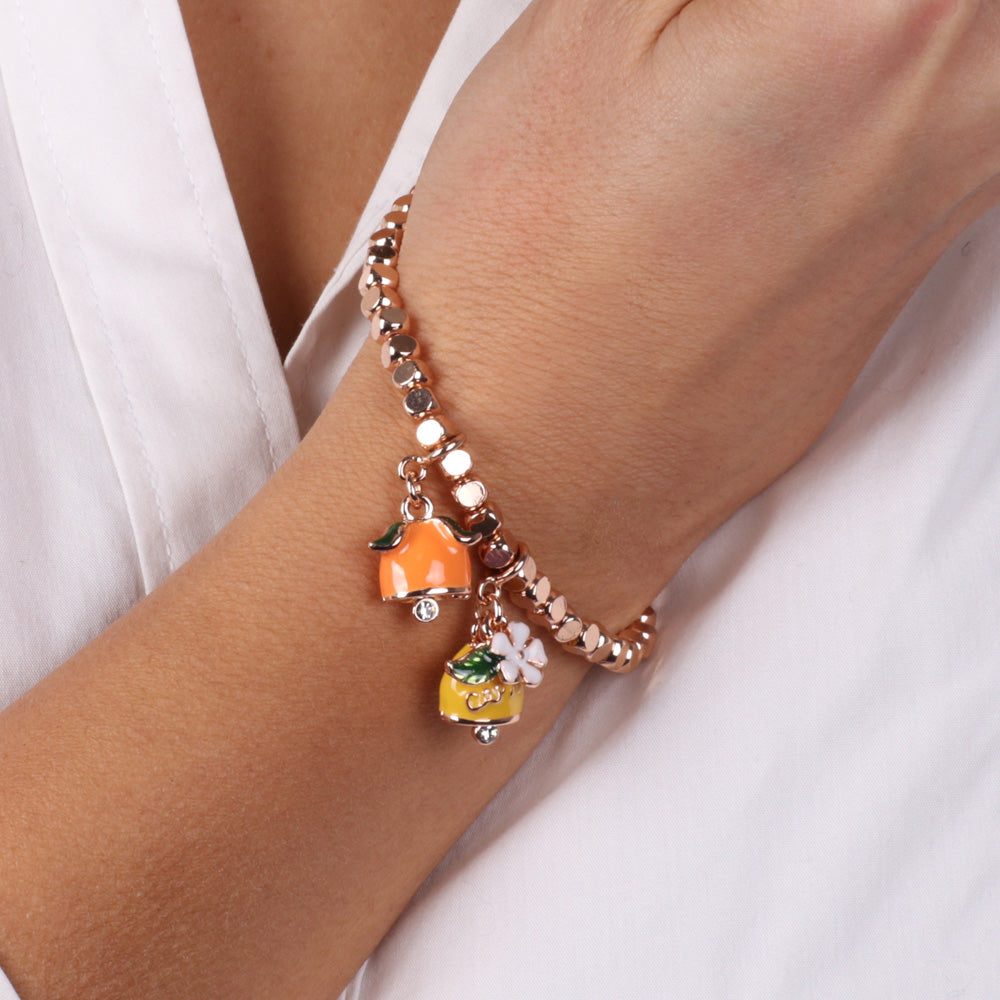 Metal bracelet with cubes, citrus fruits bells embellished with crystals