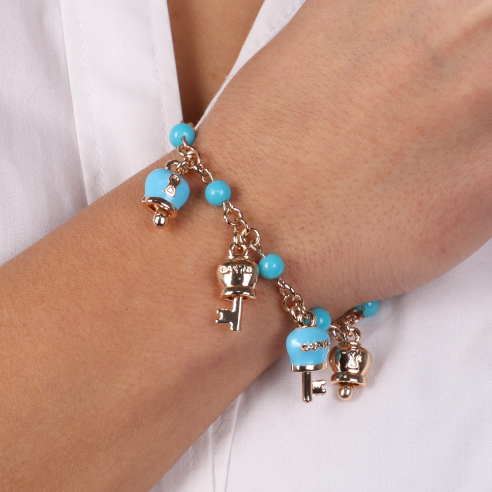 Metal bracelet roller jersey with Turchesini, charms padlock with bell and key embellished with turquoise enamels