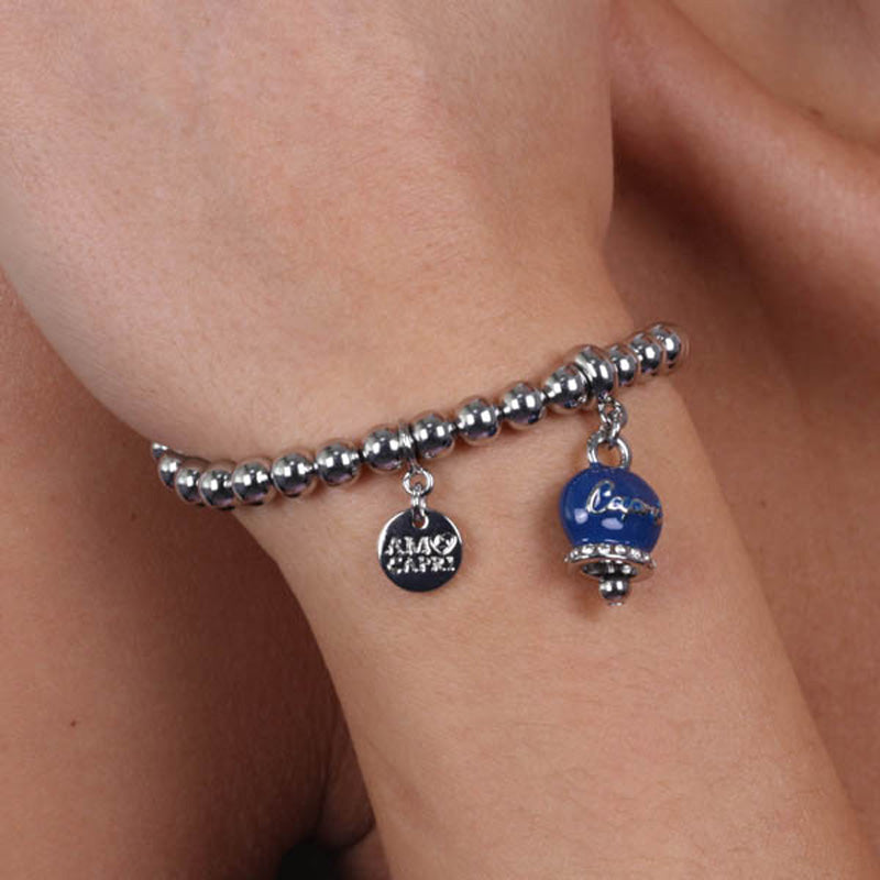 Metal bracelet spheres shirt, with written bell capri pending embellished with crystals and blue enamel