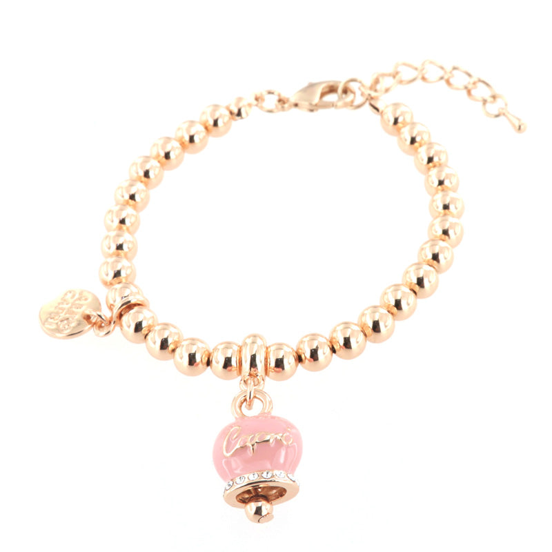 Metal bracelet spheres shirt, with written bell capri pendant embellished with crystals and pink enamel