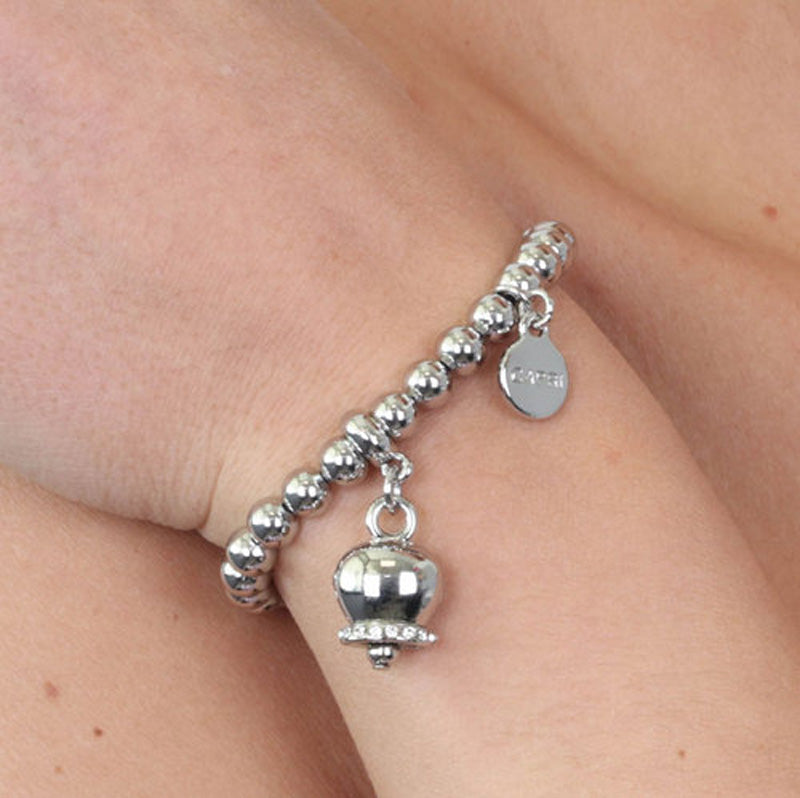 Metal bracelet spheres shirt, with a pendant charm bell, embellished with crystals