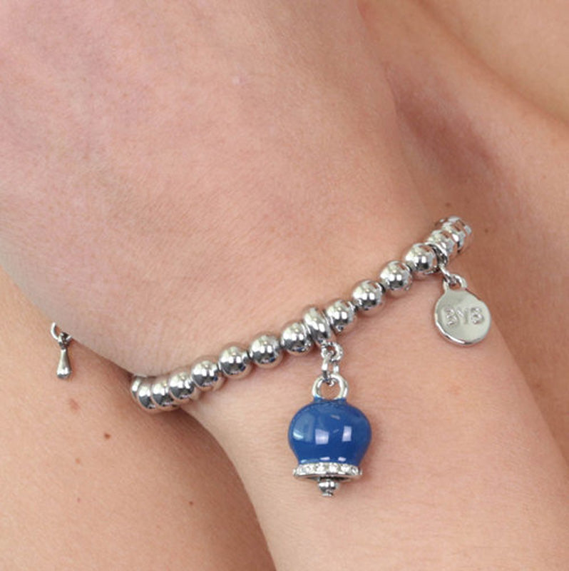 Metal bracelet of ball jersey, with a pendant charm bell, embellished with blue enamel and crystals