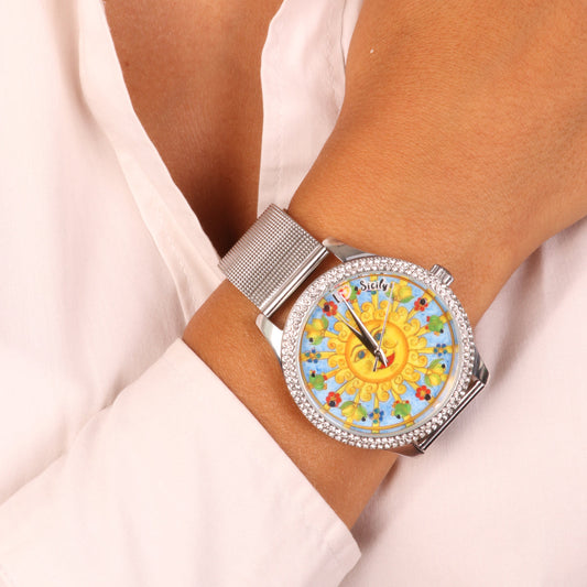 Analog metal clock dial embellished with Sicilian symbols and white crystals